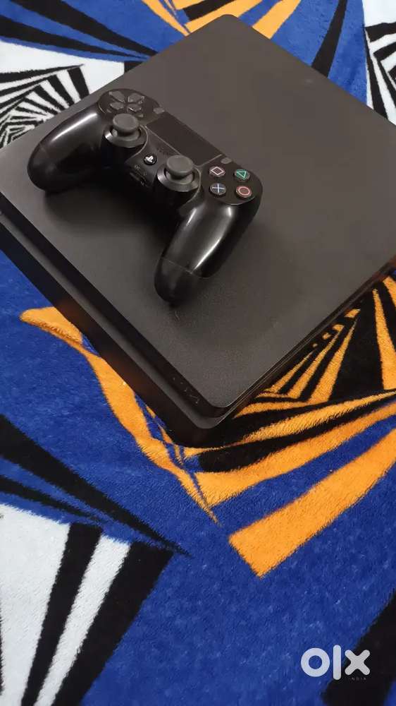 Ps4 slim 1tb only 6 months used + 5 games in new condition