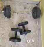 Dumbell set along with curl rode