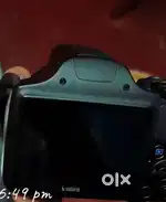 Canon camera with camera bag and charger and battery