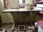 JUKI sewing machine with electronic motor and table for sale