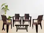 Four fibre chairs with 1 table