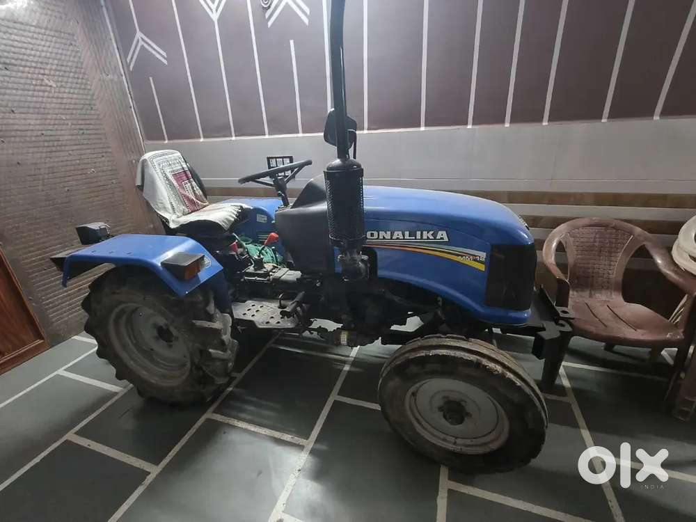 Small tractor Sonalika with trolley