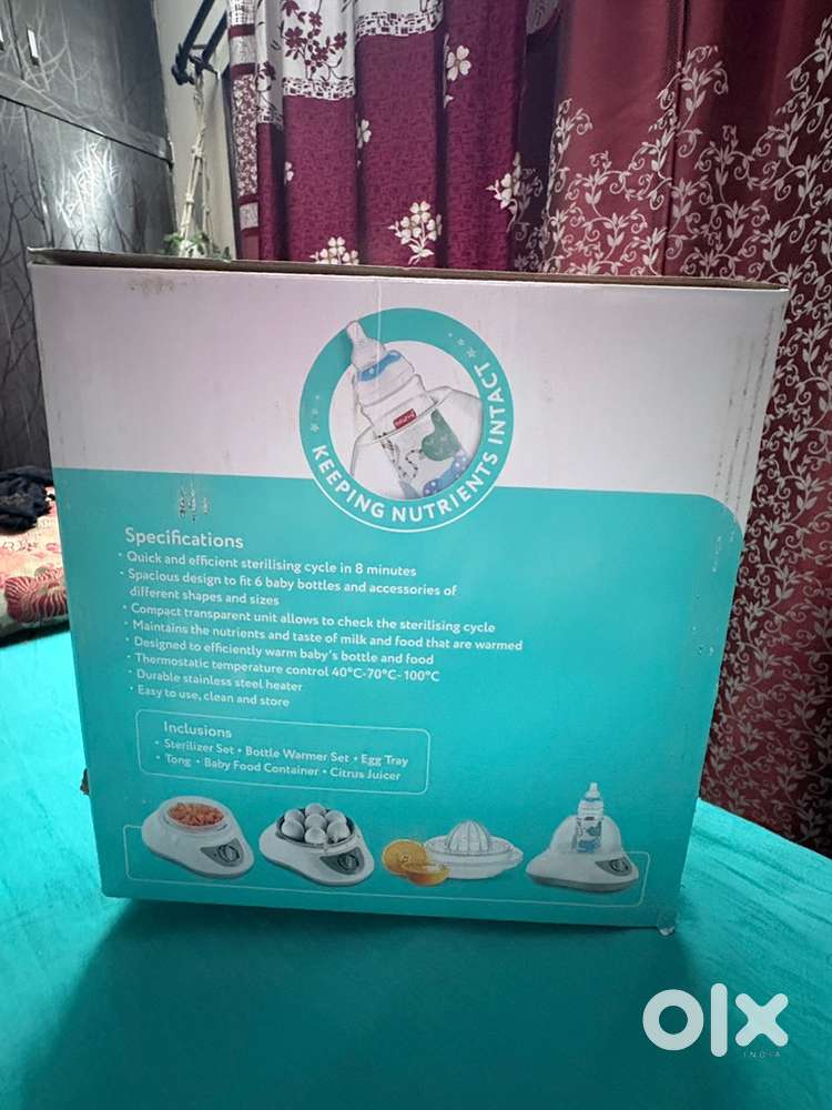 Babyhug 6 in 1 steam sterilizer cum warmer.