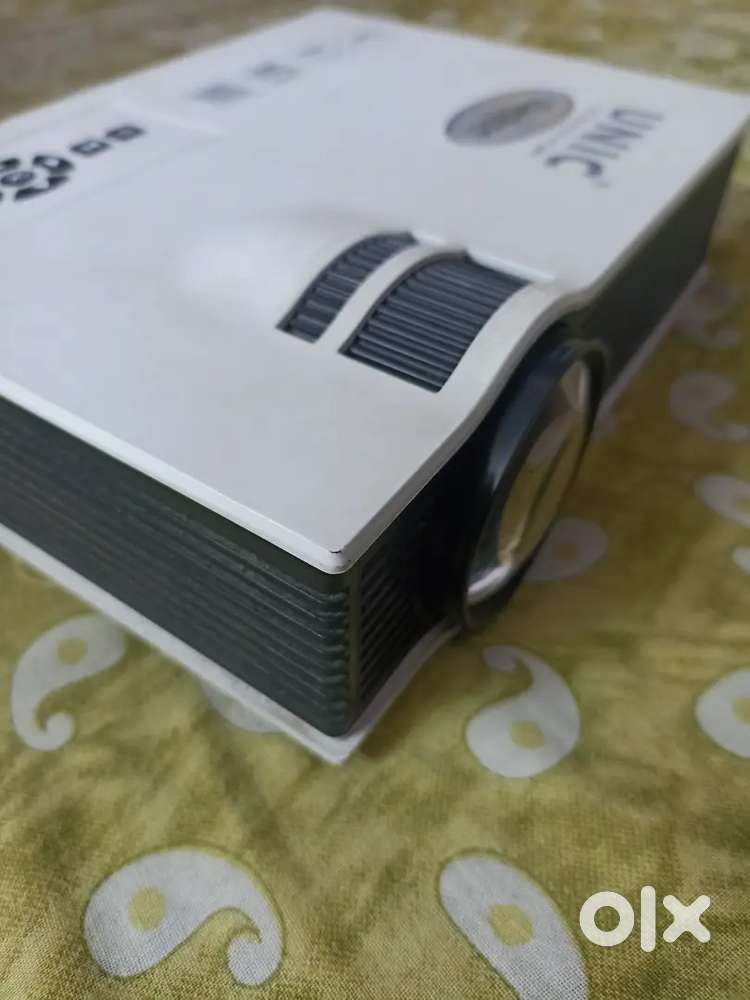 X electron unic projector