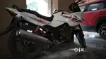 Single owner , Sparingly used - Karizma R (White)