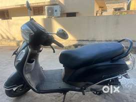Suzuki access , only lady using bike
