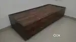 Very less used single bed cot with storage
