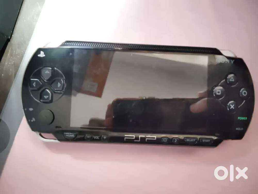 PSP model 1000 3 games free with charger and price 3000