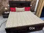 King Size double bed with single mattress and side tables