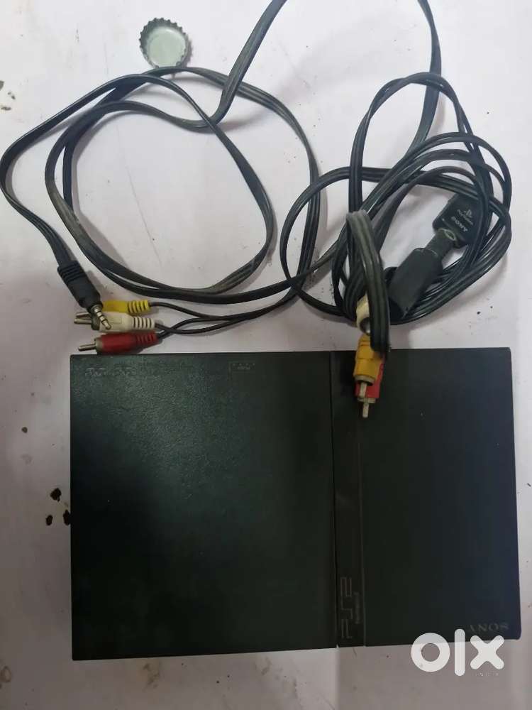 Sony PS2 Slim + 2 Controllers + AV Cable + Game CDs (Full Working)