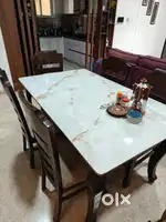 6 seater wooden dining table with marble top