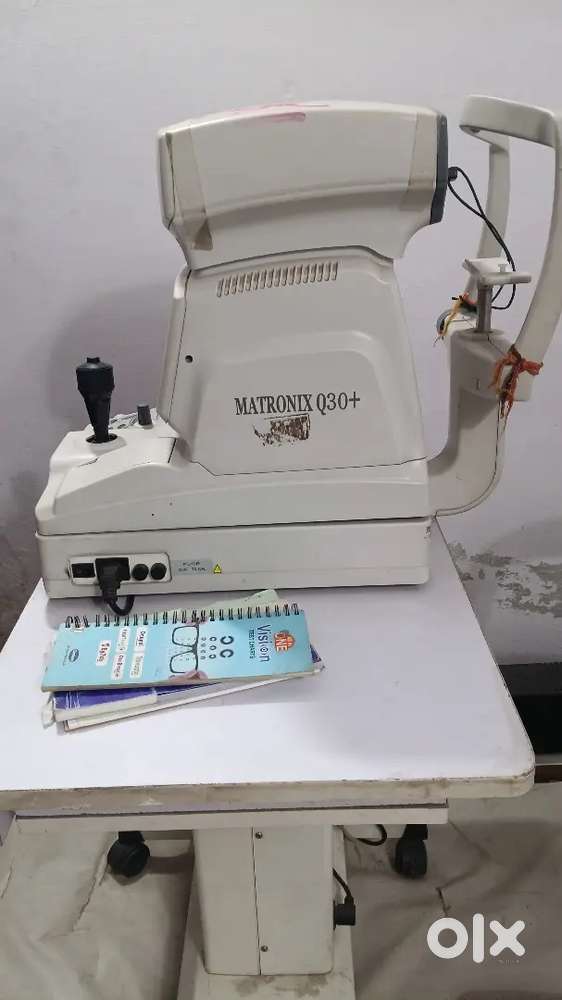 Auto refracto metar machin with table