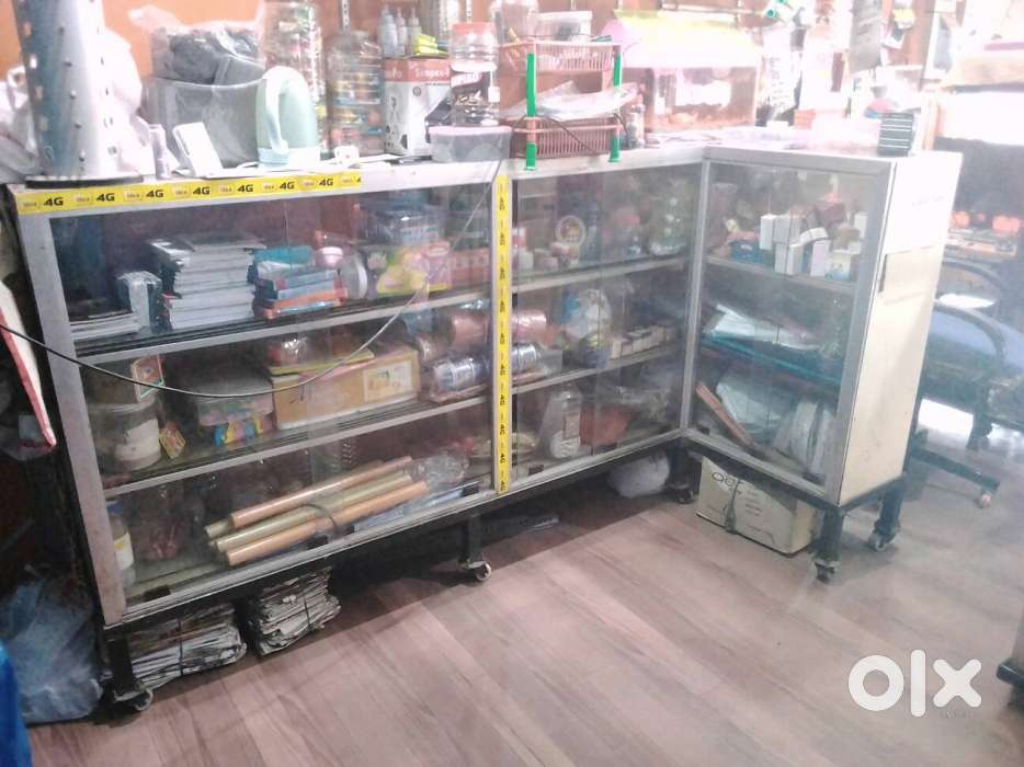 Clear Glass Display Counter With Gray Metal Frame