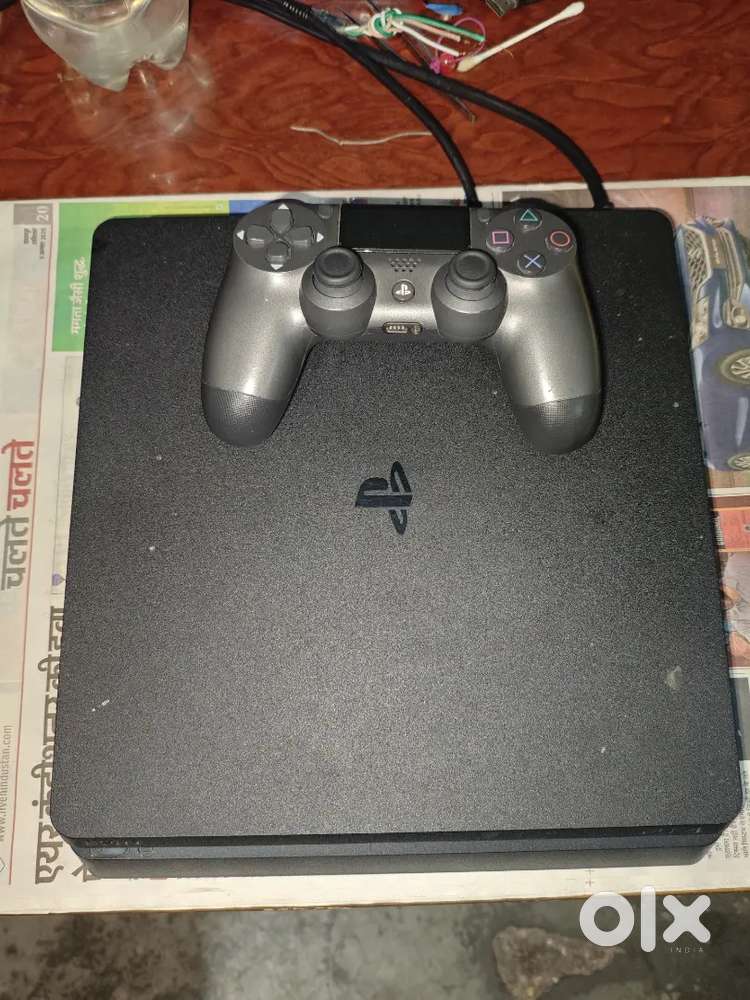 PS4 Slim With 2 Controllers 9.00