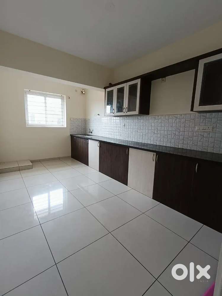 2bhk semi furnished with kitchen cabinet Cots and sofa set is there