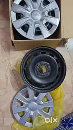 4 rims 14inch with ford wheel caps