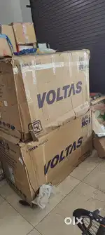 Selling voltas 320 liter deep fridge new with bill and warranty grey