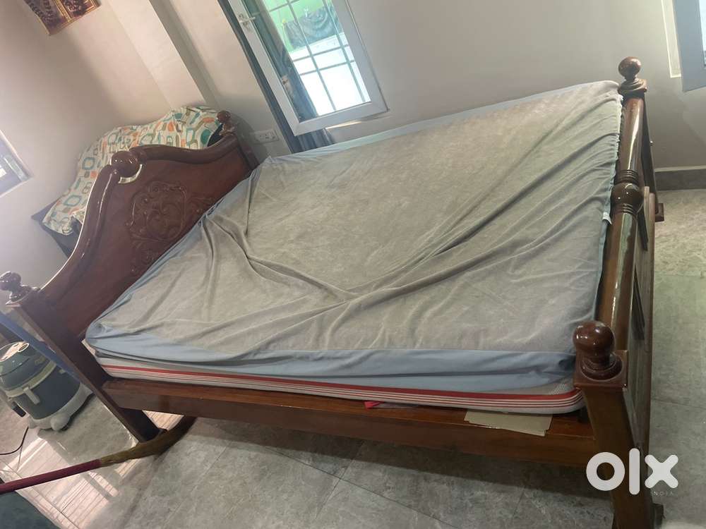 Queen size bed along with 8” Mattress