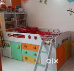 Kids bunk bed with storage