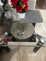 Glass top coffee/ center table with glass shelf