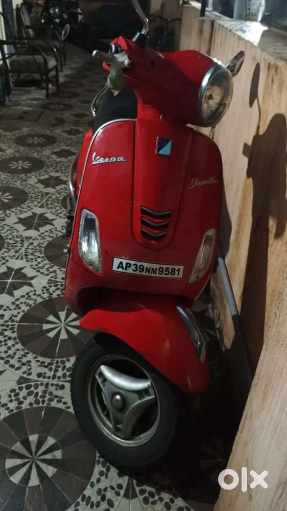VESPA -2022 MODEL, LADY USING VEHICLE, Less Used