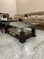 Price negotiable 7 seater heavy and wooden sofa set with table