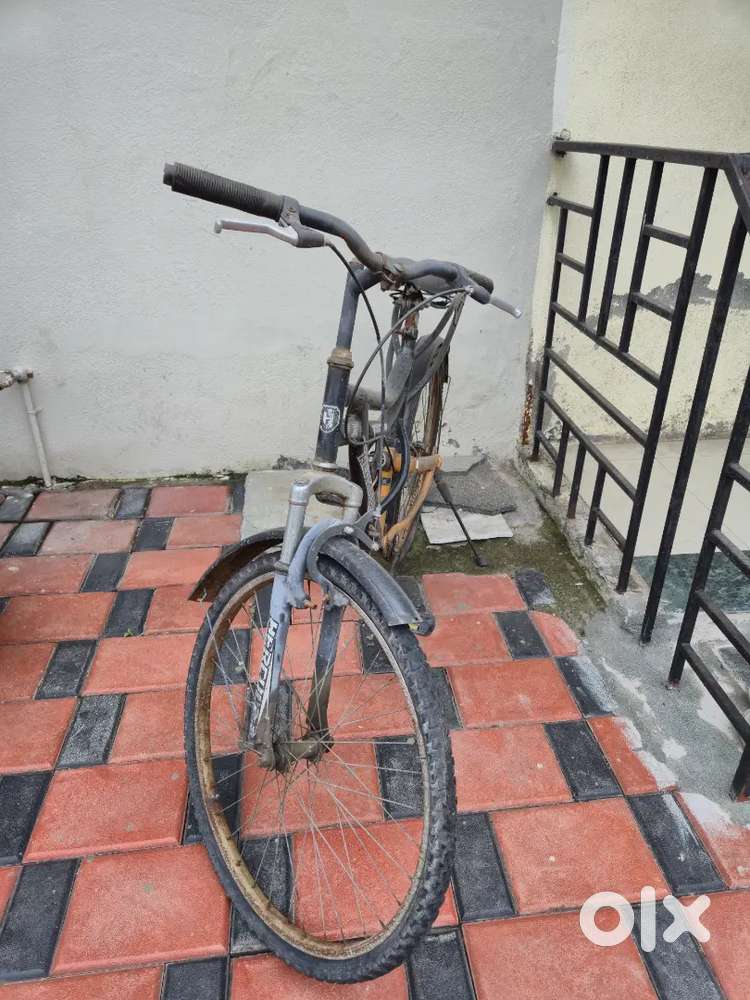 Black orange semi new Hercules cycle