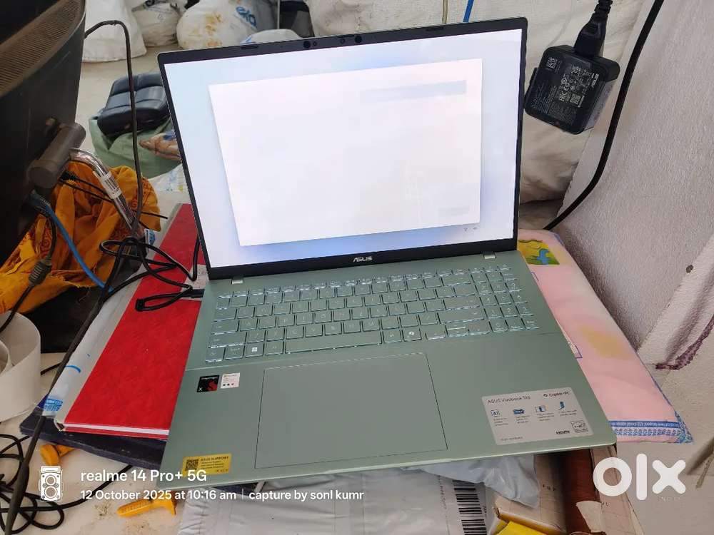 Asus vivobook S16 OLED ( 2025 ) with   snapdragon X processor