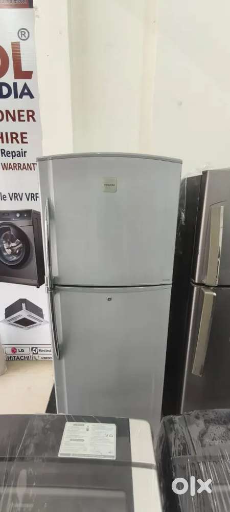 Double door fridge good condition with warranty 1 year old