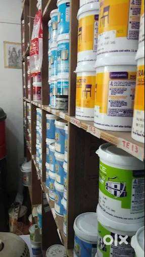 salesman in paint shop