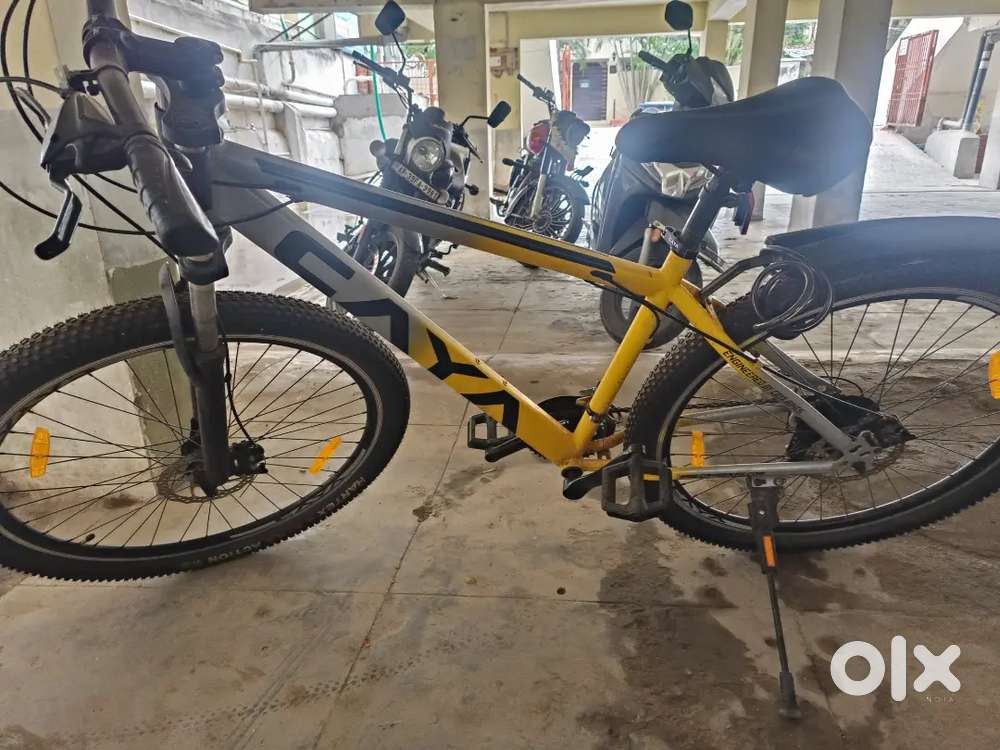 CAYA yellow and grey matte finish double suspension 21 gear cycle
