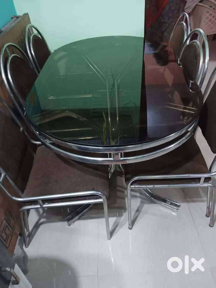 Glass Dinning table with 6 chairs