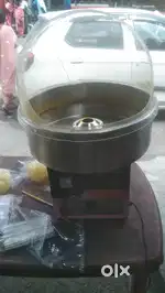 Cotton candy machine with cover flap