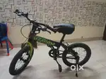 Kross kids cycle black green 16 inch