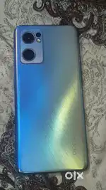 Reno 7  256 exchange with iPhone and another curved display