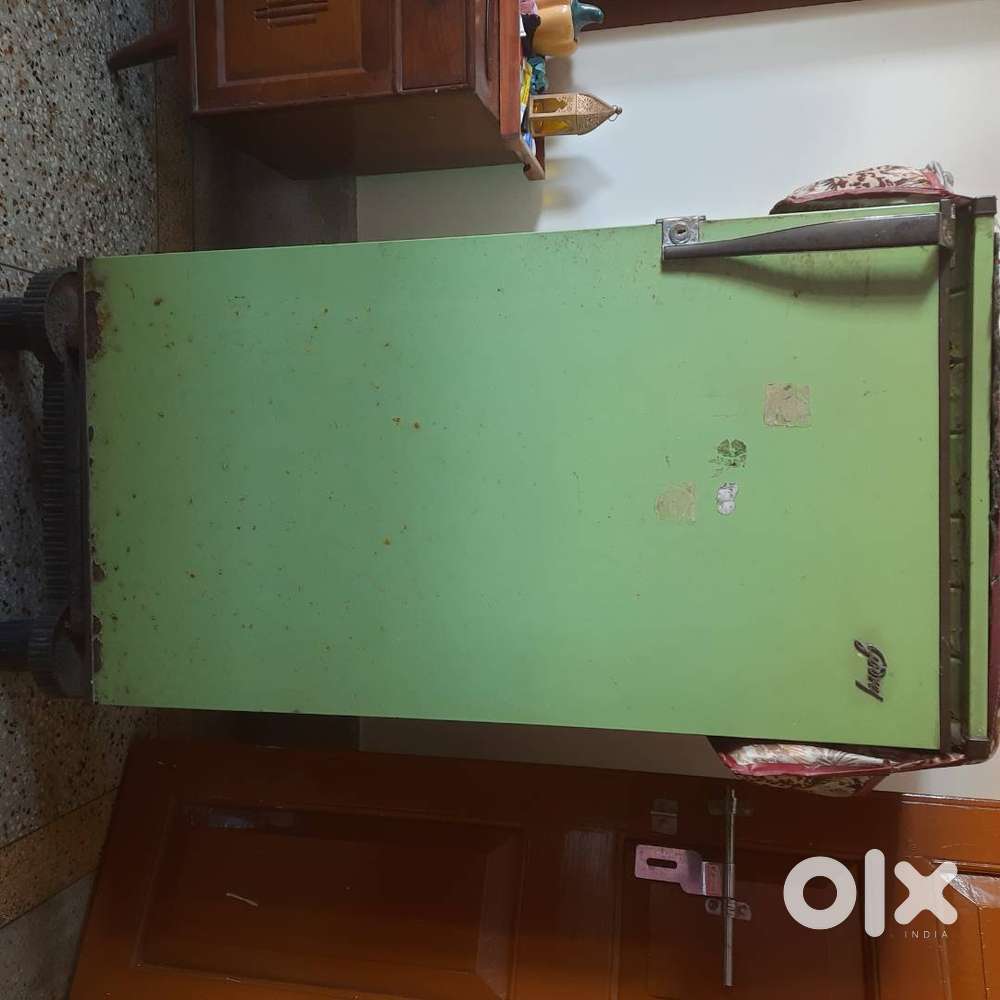 Godrej single door green colour fridge