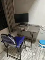 Computer screen Lenovo and table chair