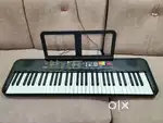 YAMAHA PSR-F52 PORTABLE KEYBOARD WITH
61 KEYS, Black I