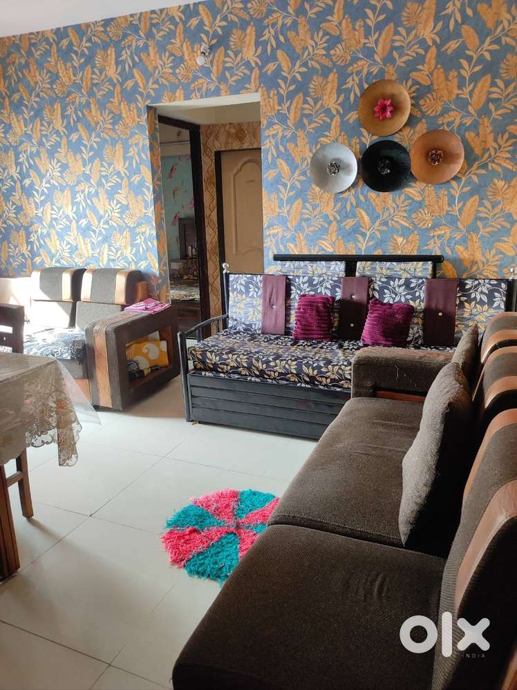 Semi furnished flat with modular kitchen ,cupboard,bed ,sofacumbed