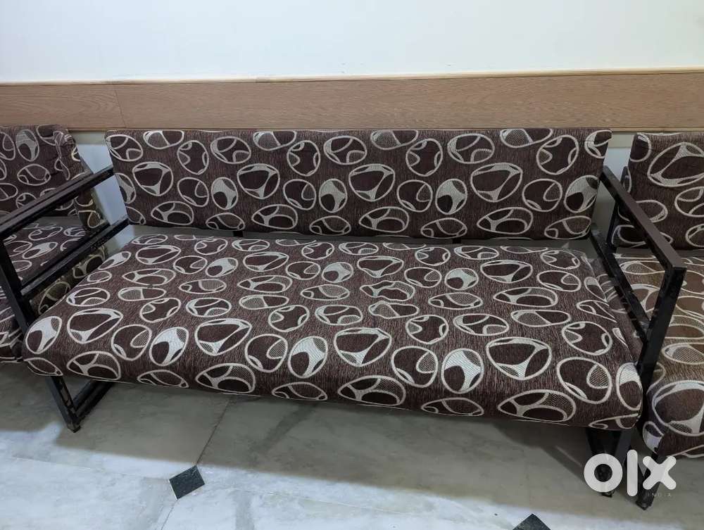 Sofa on metal base used as out patient reception sitting