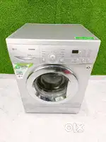 LG silver colour, front load washing machine less used