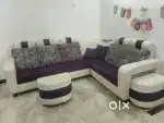 Stylish cream & purple L shaped sofa with matching cushion & stools.