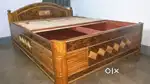 A beautiful box bed having size 5/6.5.