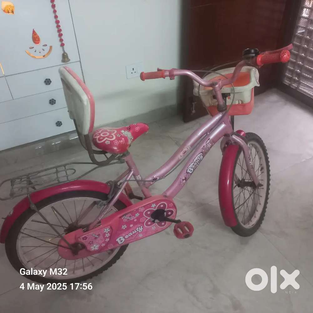 Kids bicycle with adjustable seat. Just 1 year old. New condition