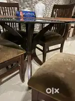 Glass top dining table
