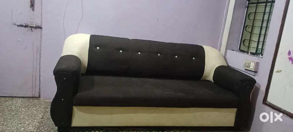 One sofa set , colour brown & cream