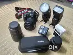 Canon 80D along with lens and flash