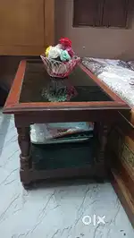 I selling my centre table with glass top good condition urgent sale