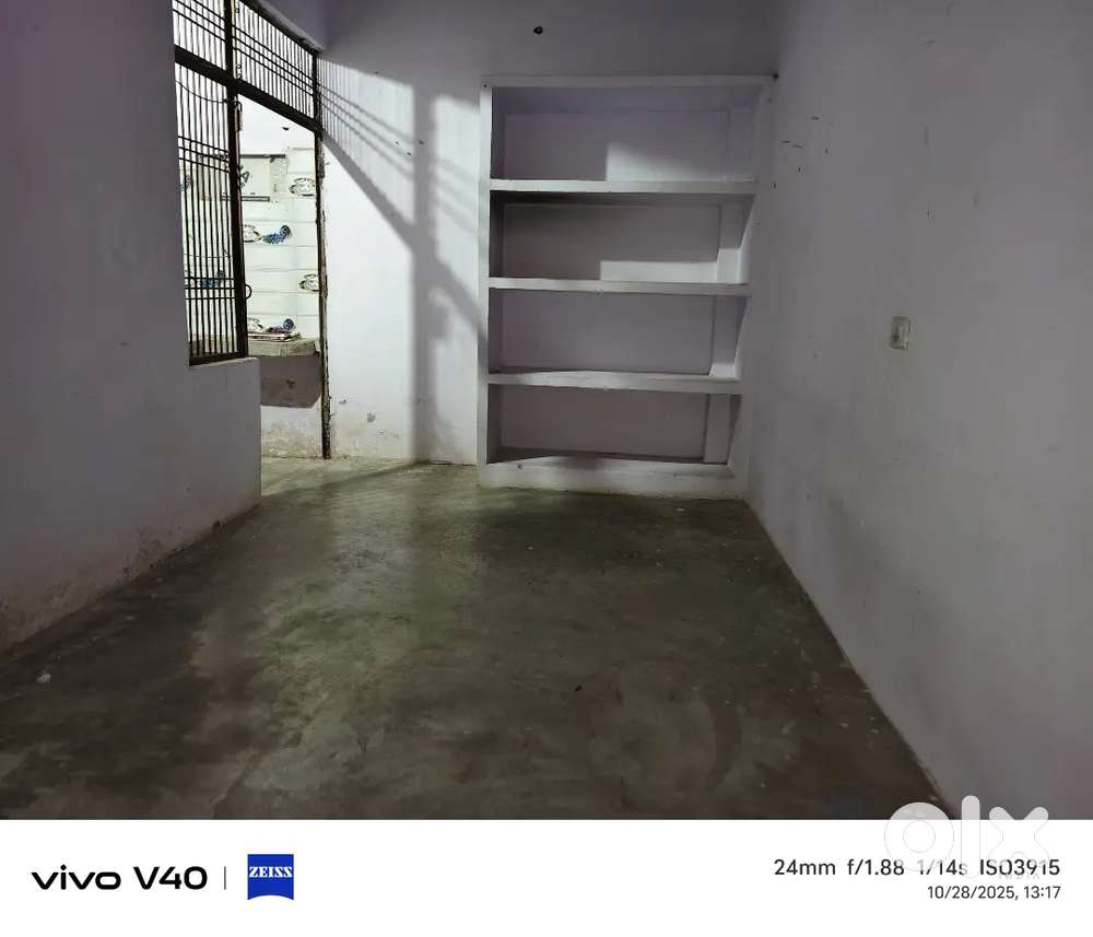 Room with bathroom and kitchen attached with it