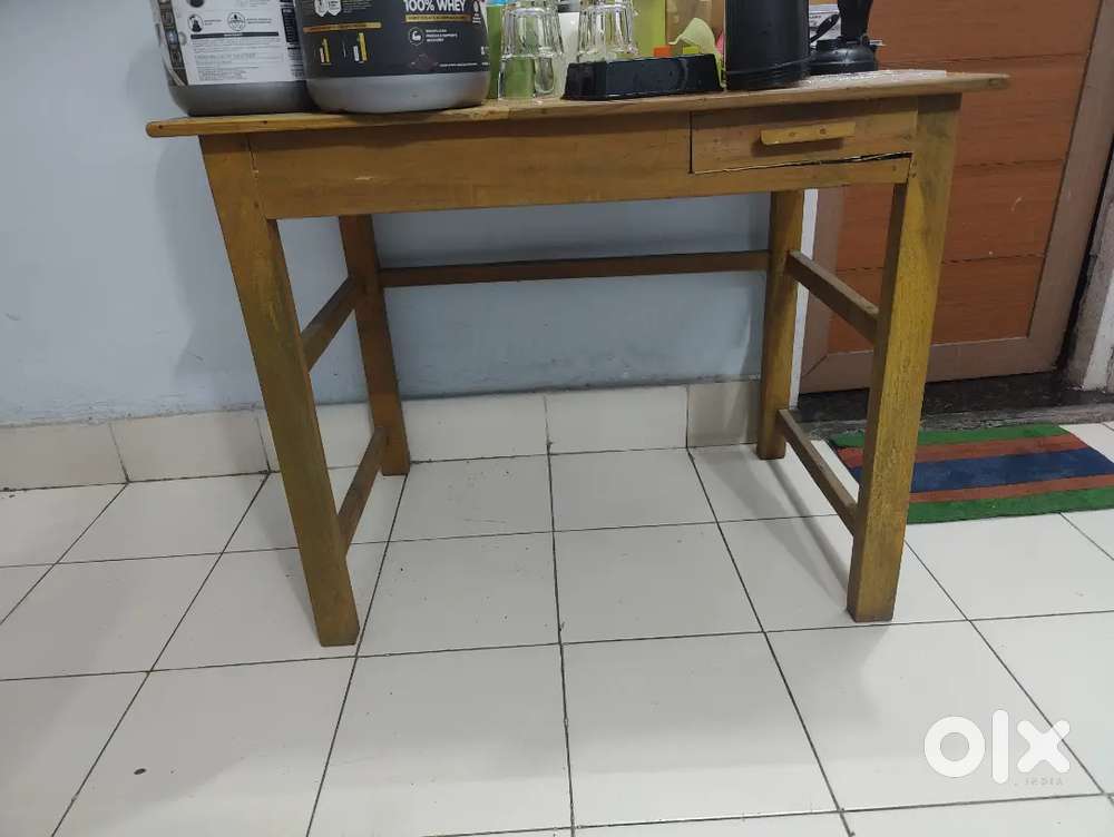 table and electric heater and extension and mattress